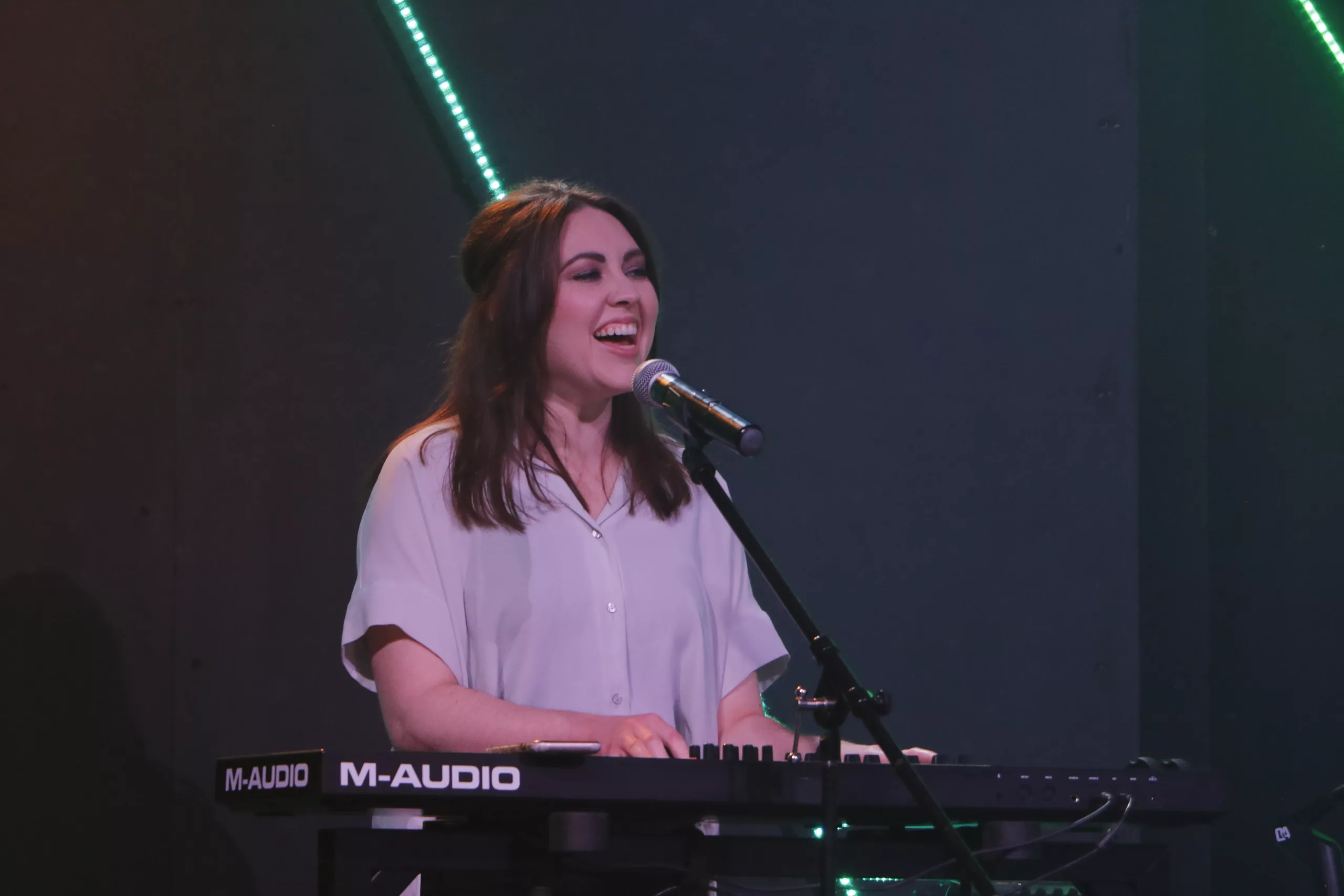 Victoria smiling on keys